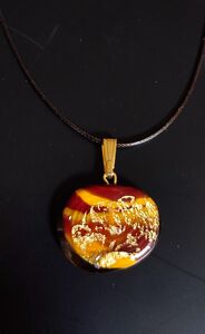 Red & yellow circle pendant with gold touches