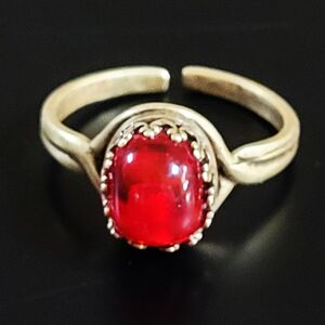 Oval red ring